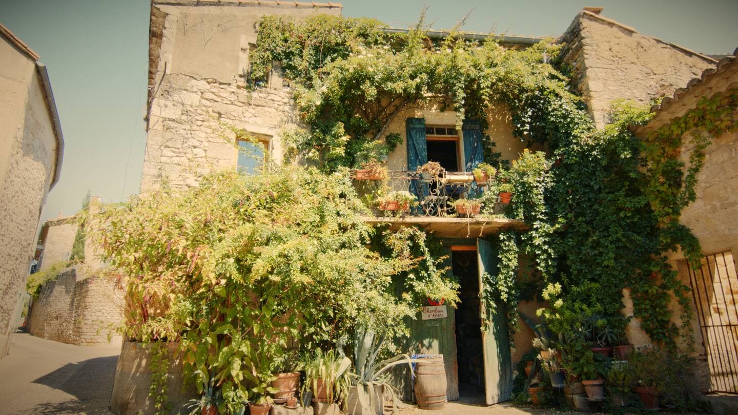 Stone facade of the guest house in Collias