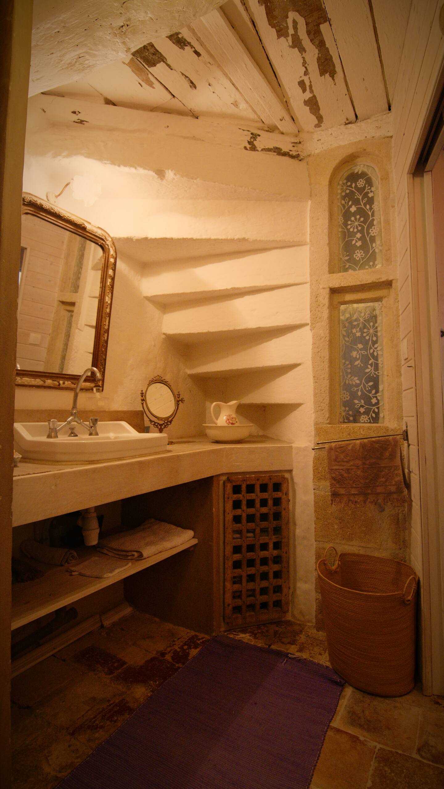 Bathroom with antique wooden furniture