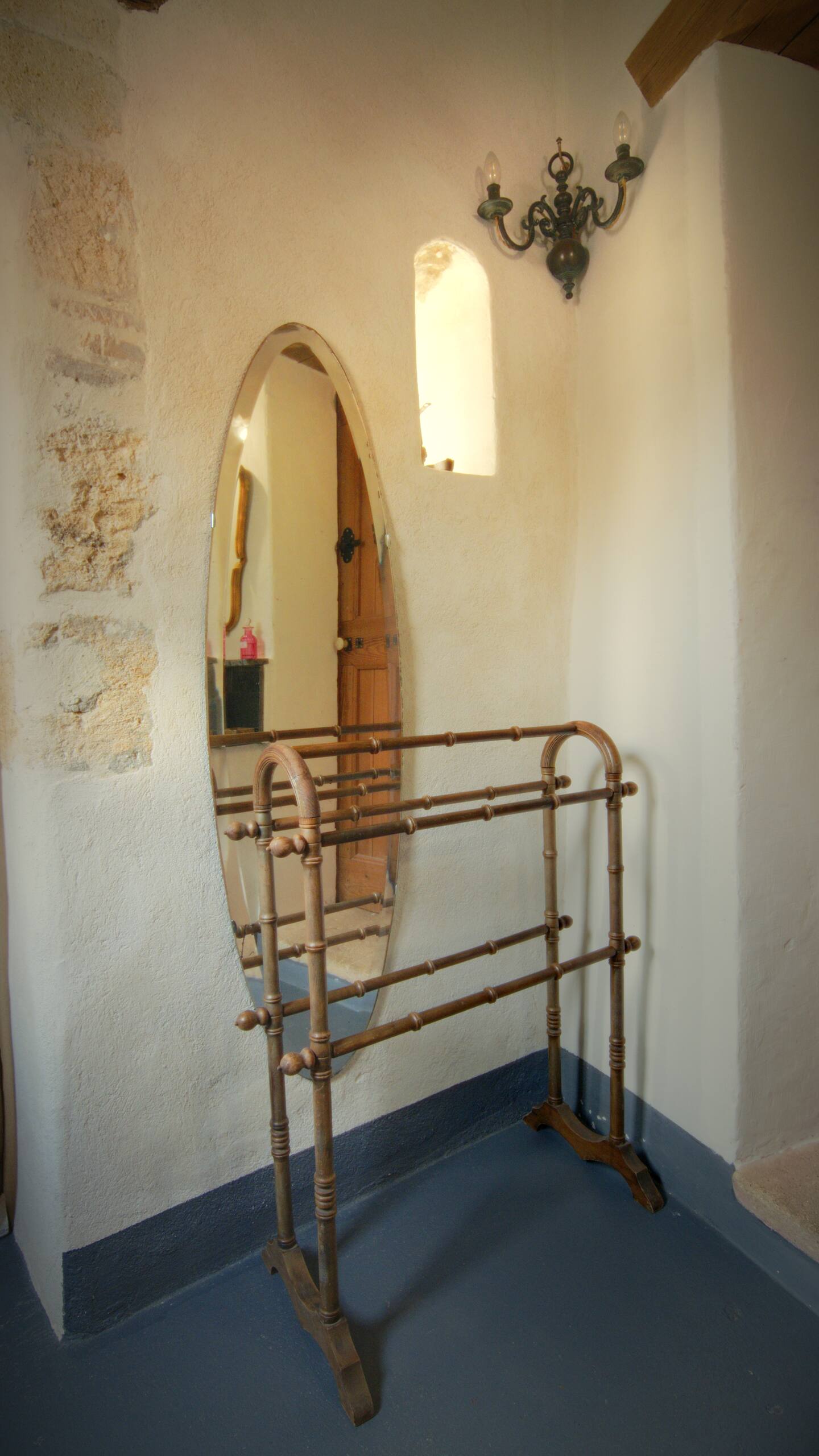 Antique mirror and bathroom storage